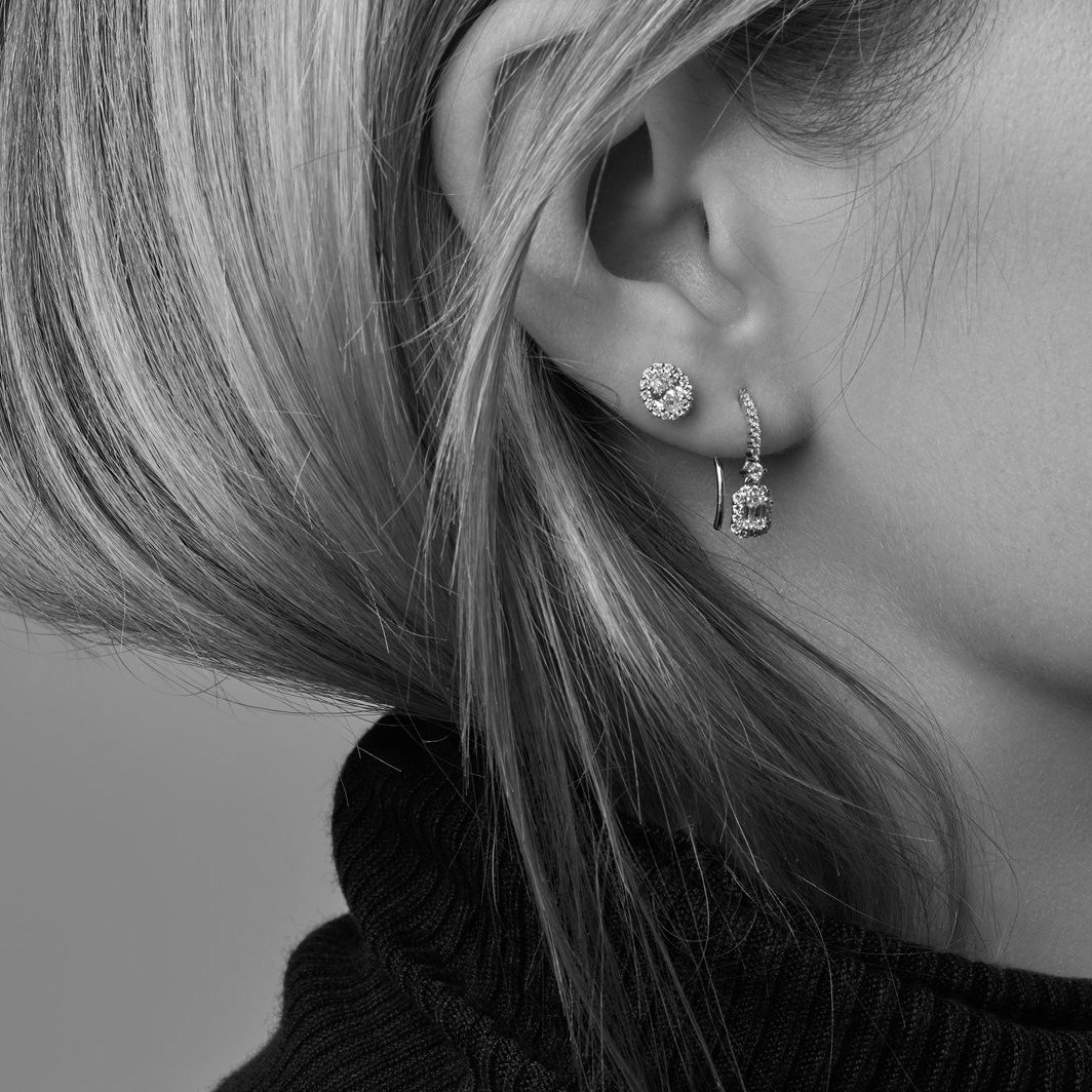 Diamond earrings, worn