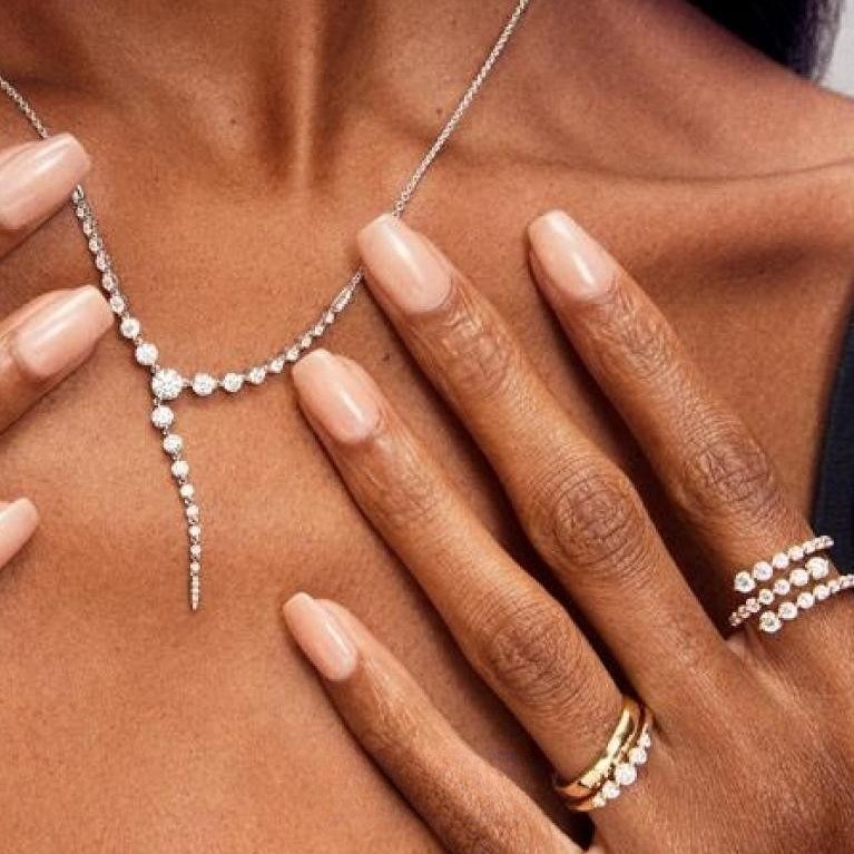 Zales Stellar Allure Y necklace and ring stacks, worn